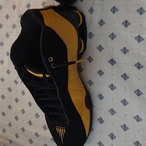 Gold and black nike